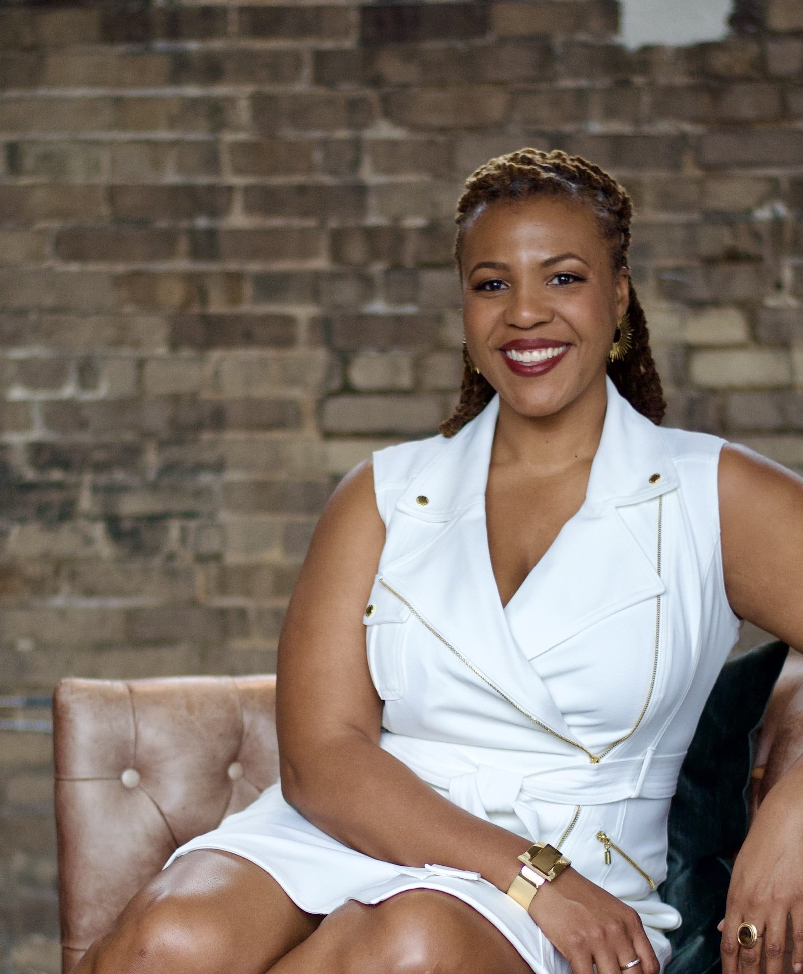 Karlyn Benn seated, sharing her story